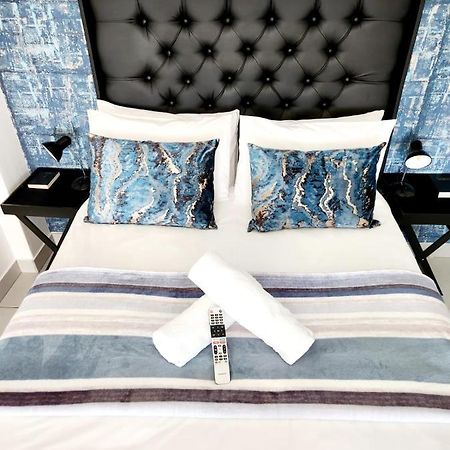 519 On Breeze Aparthotel Strand Bagian luar foto